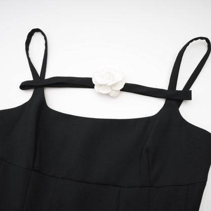 Camellia pleated black mini dress