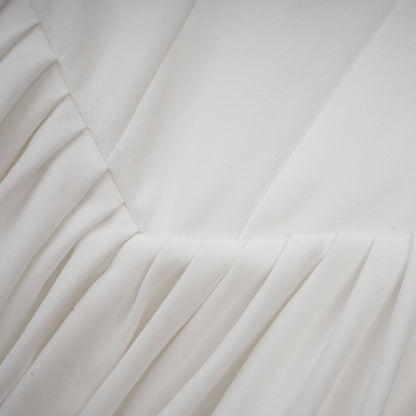 A white pleated corset dress named Sadie