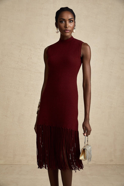 A red knitted midi dress by Celine featuring fringe detailing