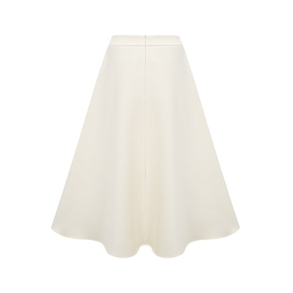 Beige matching set with top and skirt featuring 3D floral petal details in neutral tones