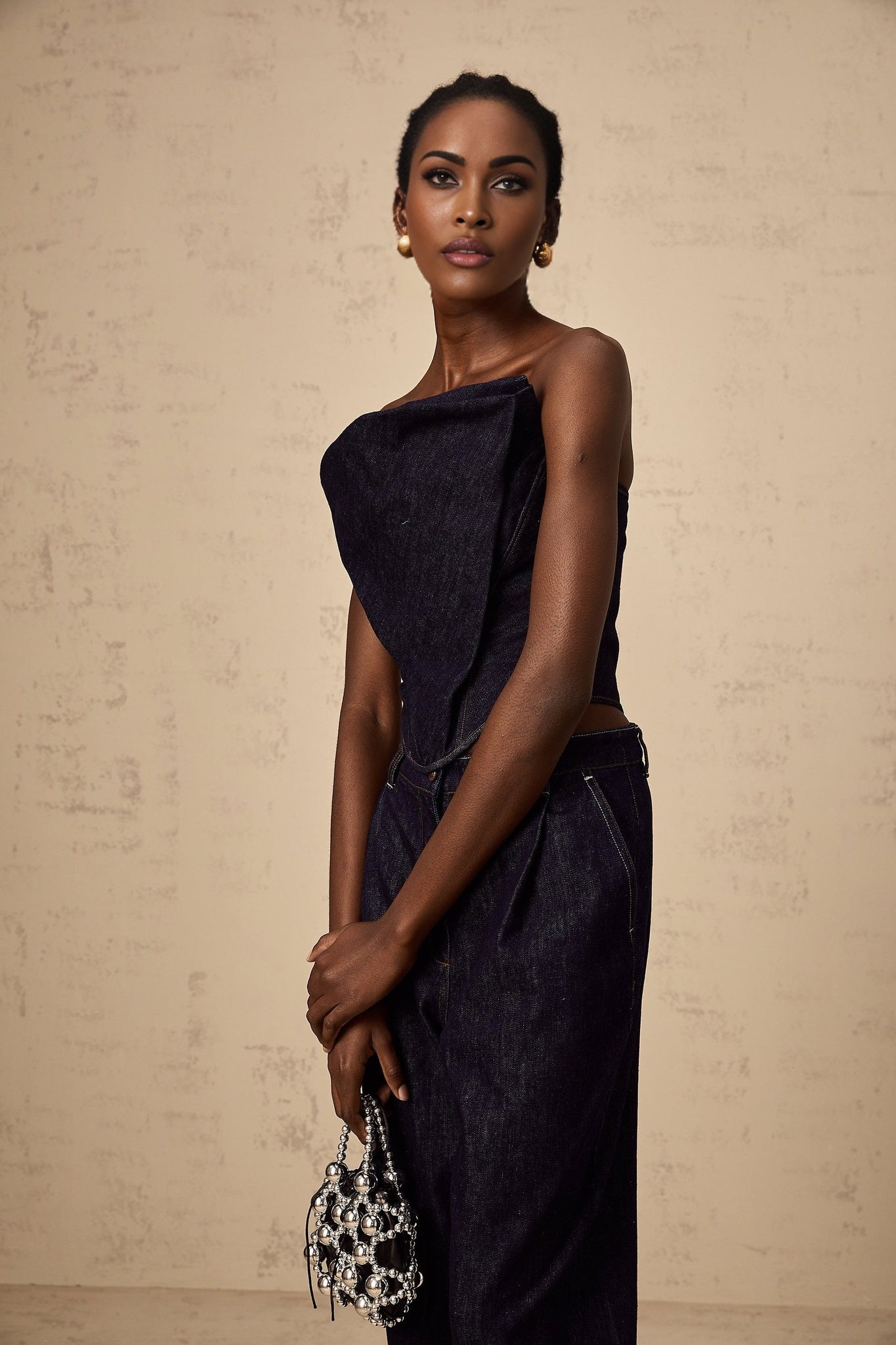A dark blue offshoulder denim top from Kleber with a loose fit and exposed shoulders