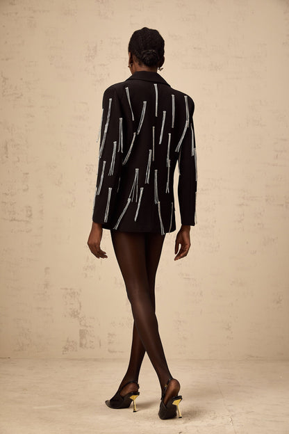 A black blazer with crystal tassels adorning the design elegant and formal outerwear for women