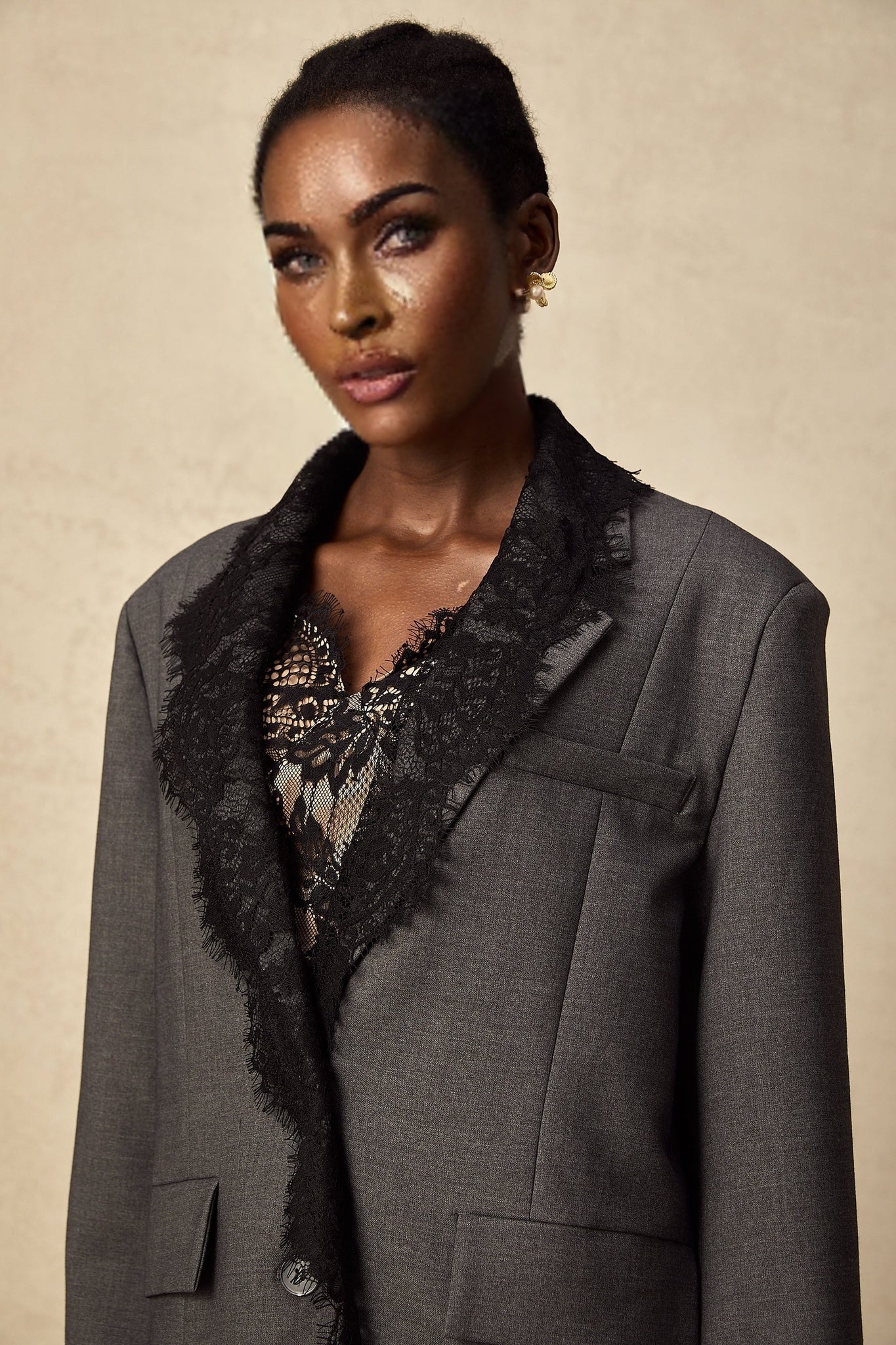 Stylish grey blazer with delicate lace panel detailing
