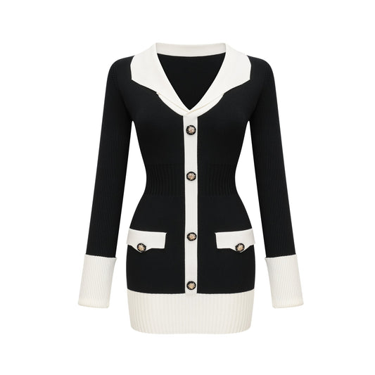 Woman wearing a short wool dress with colorblocked design and ribbed texture in contrasting shades