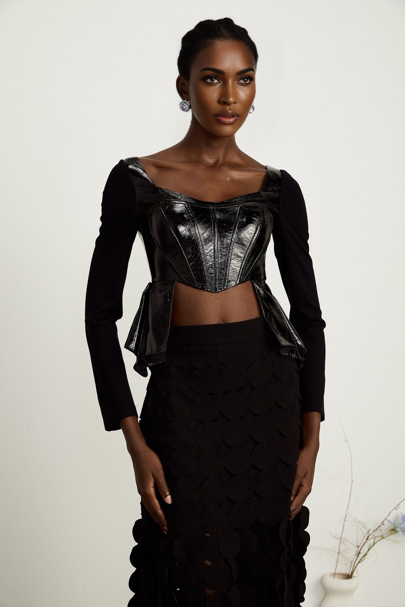 Jeannette fauxleather peplum panelled top