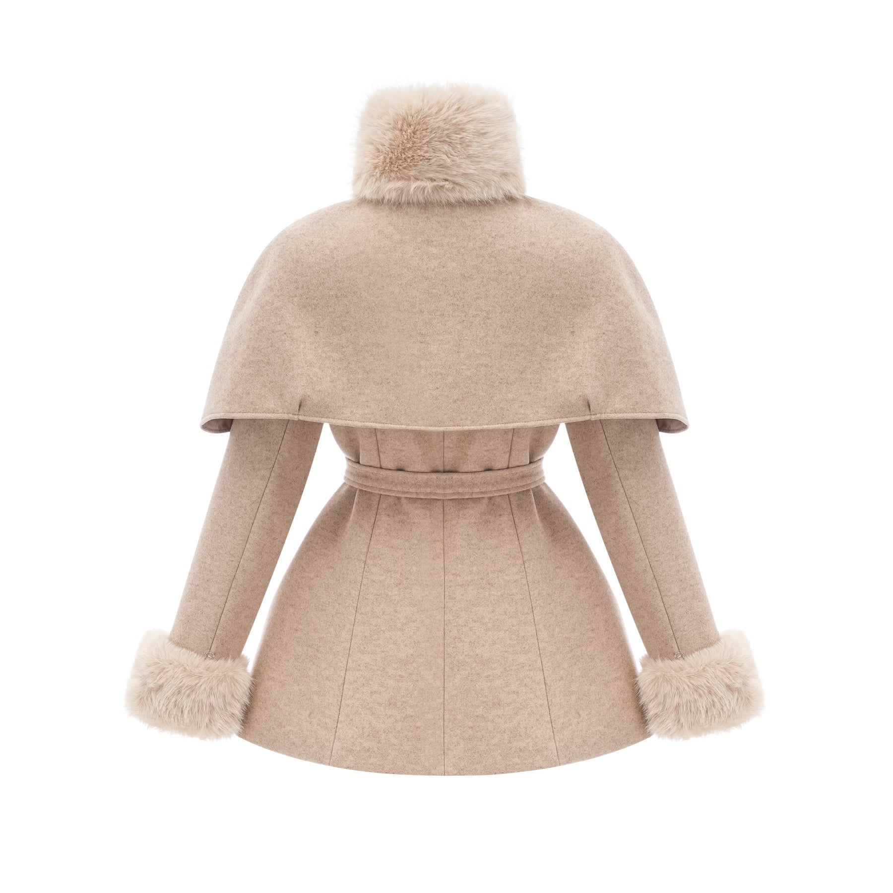 Woman wearing long black faux fur coat with detachable cape feature standing against plain background