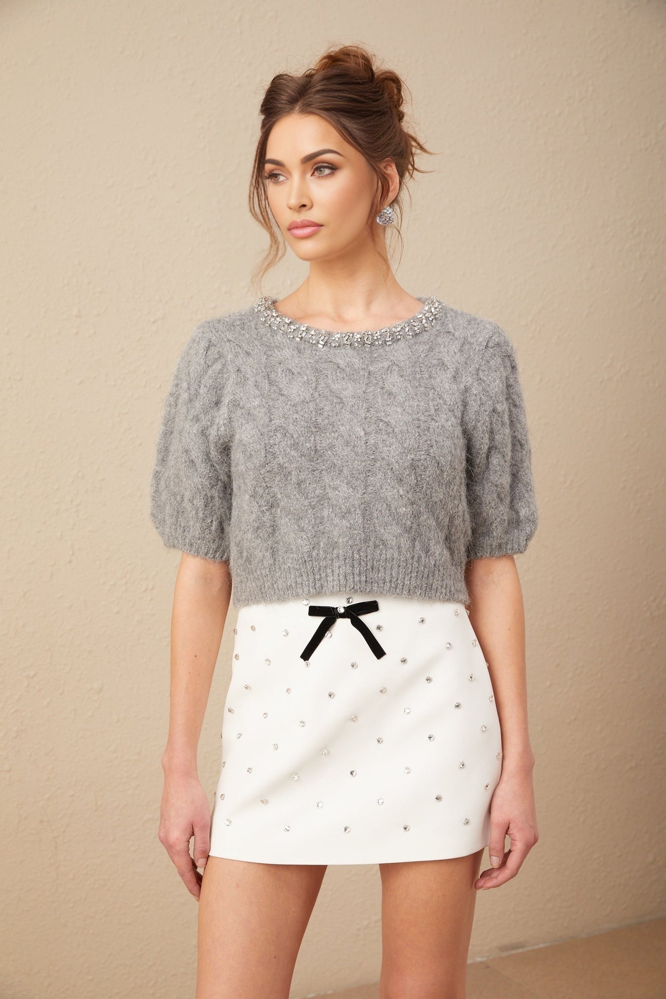 A cropped cableknit sweater in mohair with embellishments featuring a design called Ophelie