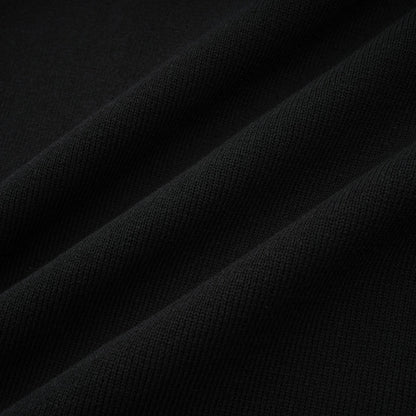 A black knitted mini dress with embellishments and ruffled details named Fabienne