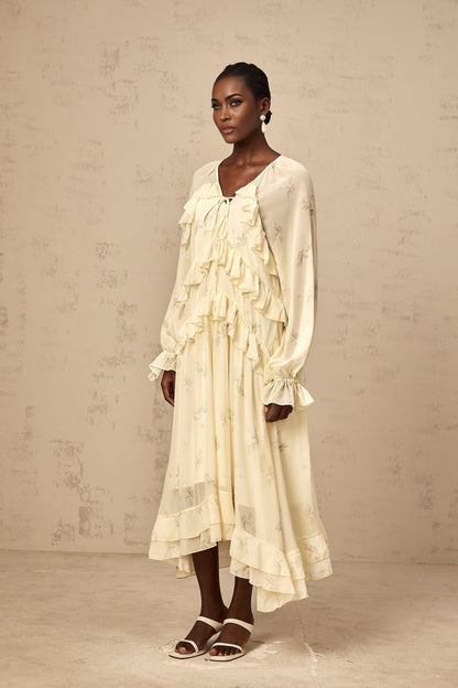 Yellow floral print midi dress with ruffles and chiffon fabric featuring a delicate pattern and feminine design