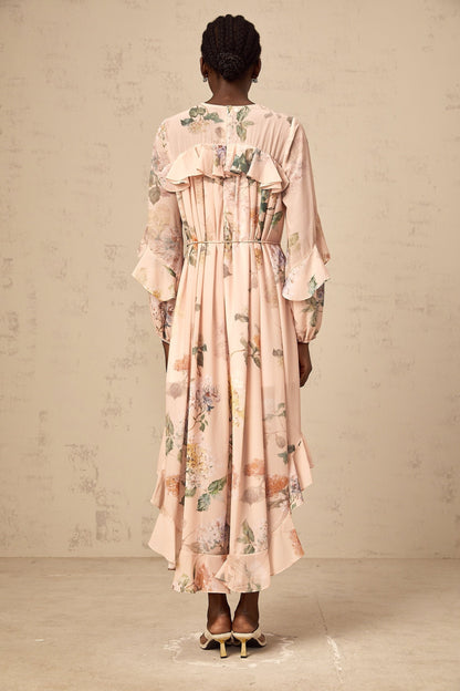 A floral print midi dress with ruffled trim named Patricia featuring a feminine silhouette and delicate pattern