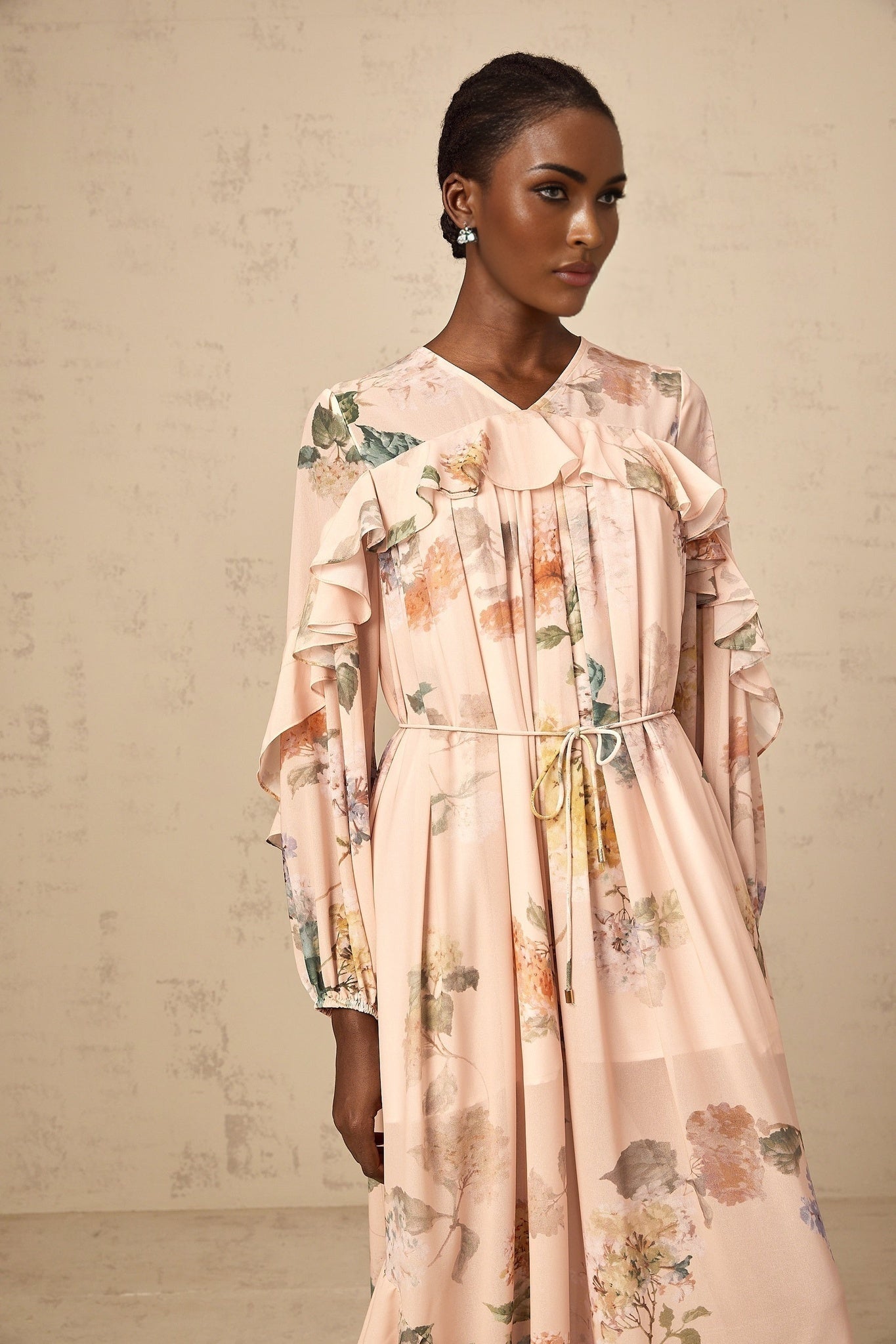 A floral printed midi dress with ruffled trim details named Patricia