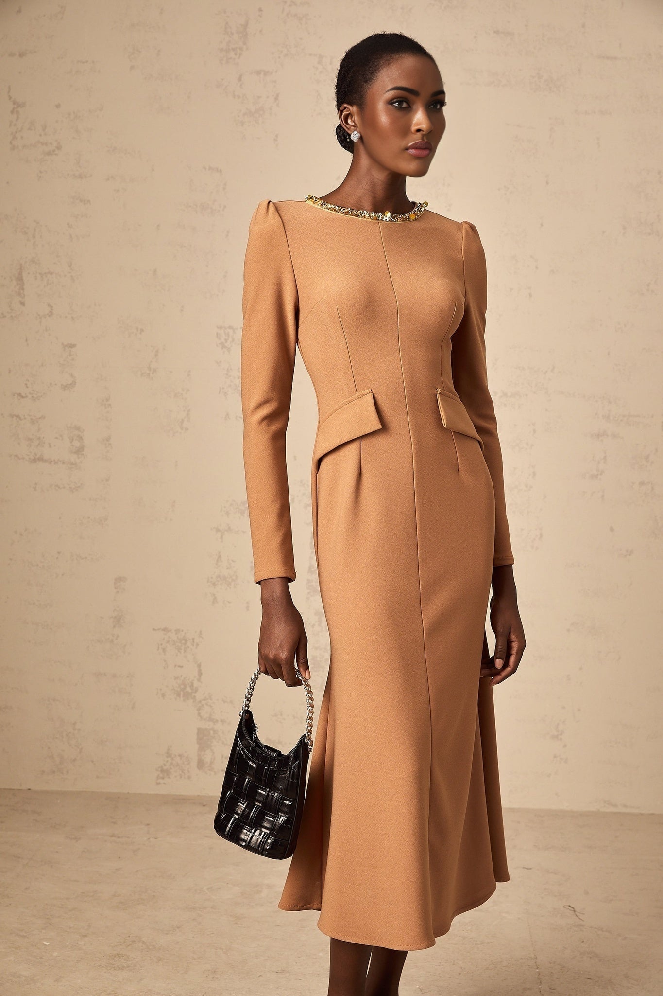 A khaki colored midi length dress with sequin embellishments named Doriane