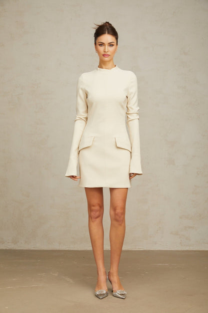 A creamwhite fitted mini dress by Chloé shown on a model against a plain background