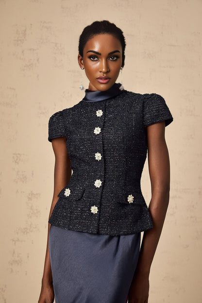 A long blue maxi dress with a peplum waist and panelled design featuring the Josette style