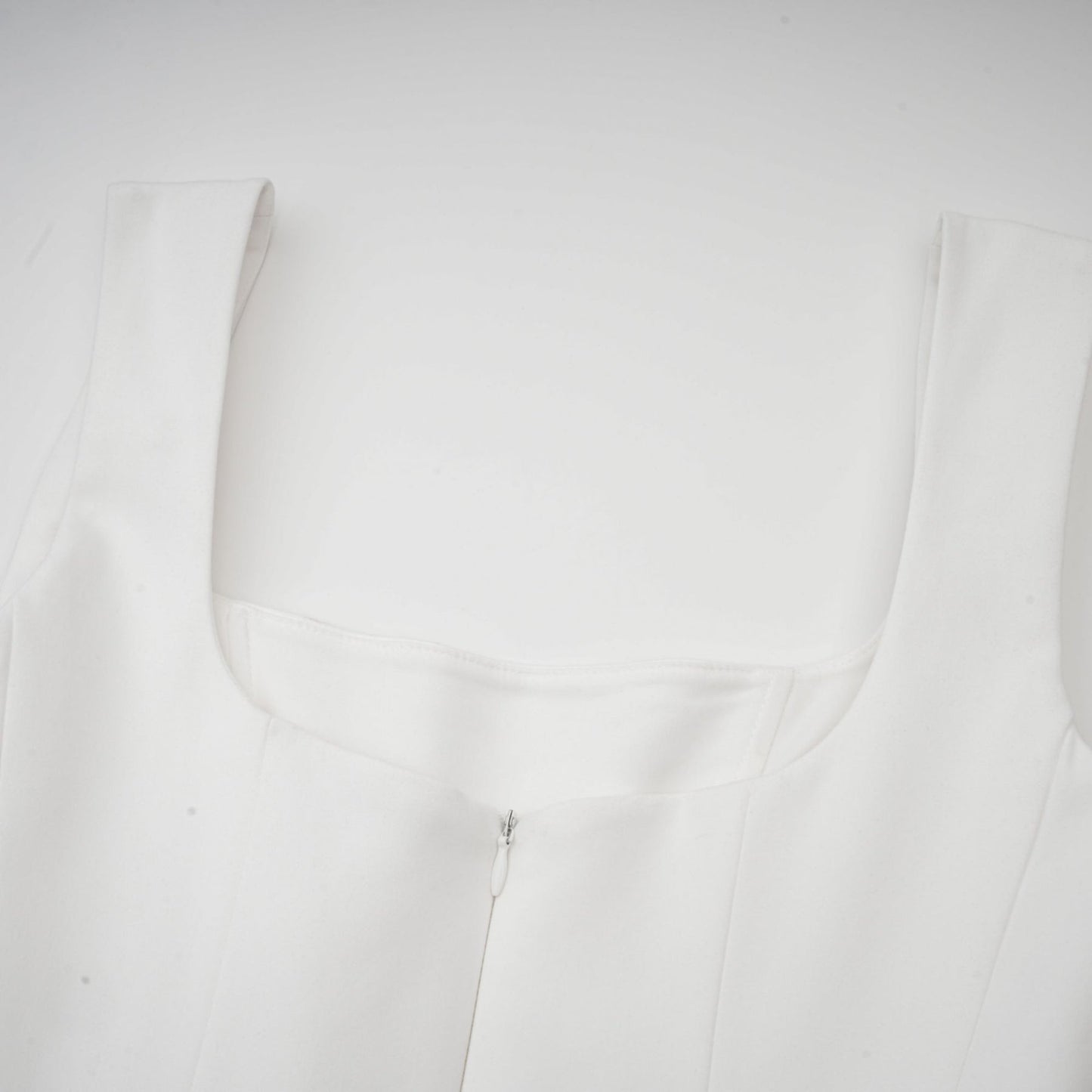 White pleated corset dress named Sadie