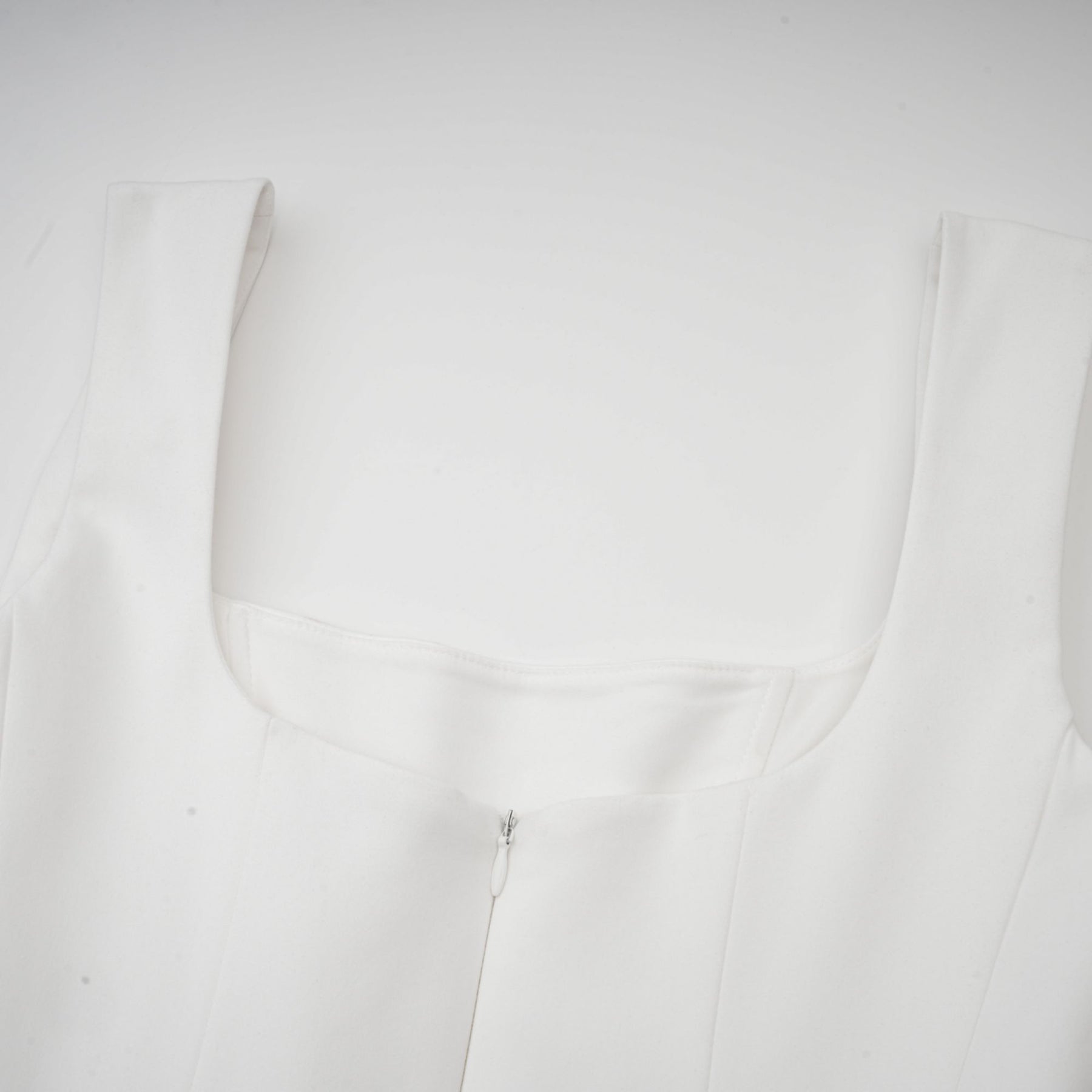 White pleated corset dress named Sadie