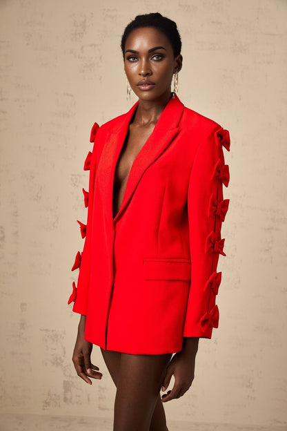 Bright red blazer with bowknot detail and cutout design