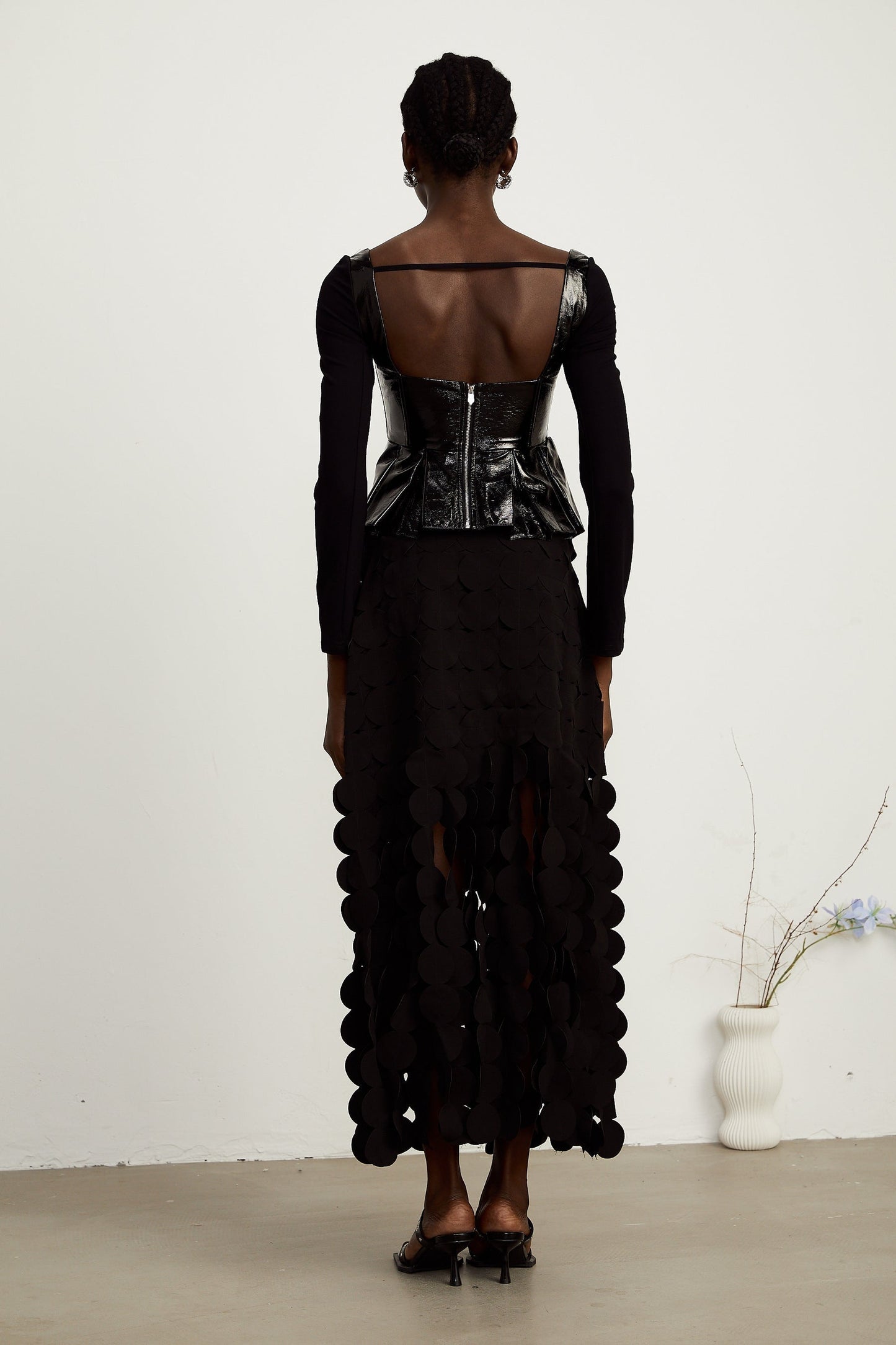Jeannette fauxleather peplum panelled top