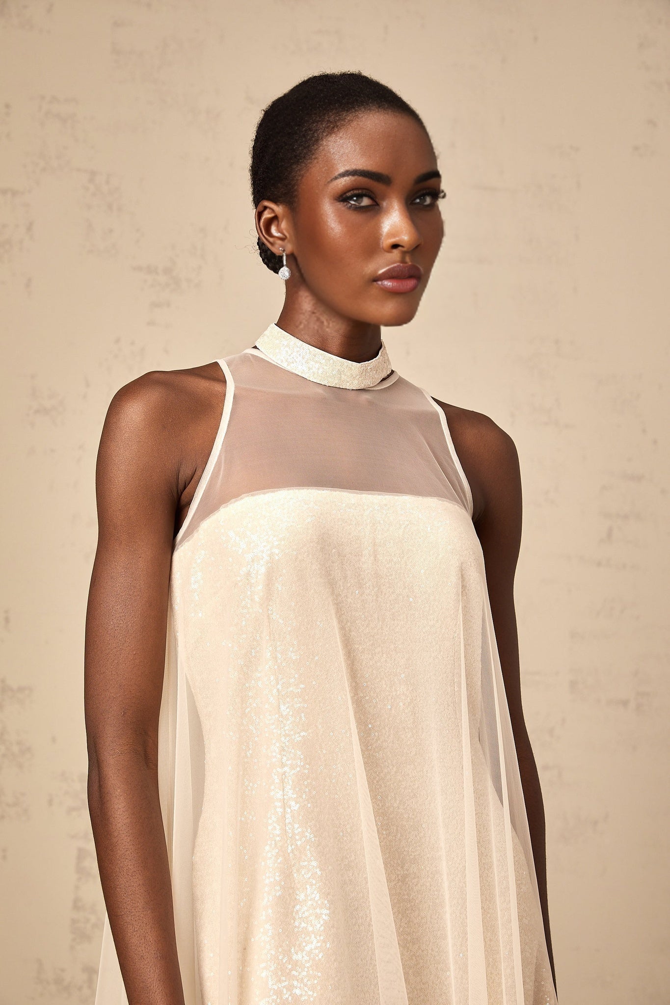 A layered midi dress with a tulle panel and sequin embellishments named Josette