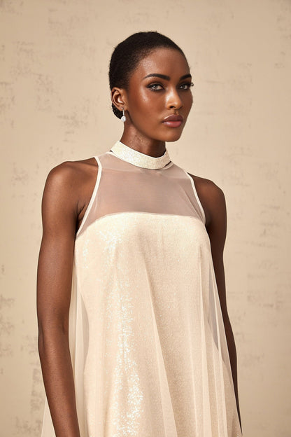 A layered midi dress with a tulle panel and sequin embellishments named Josette