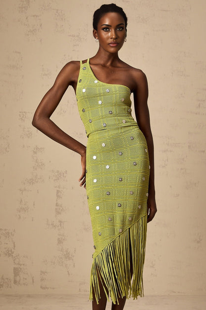 Woman wearing green knit top and skirt set with embellishments Annette matching outfit