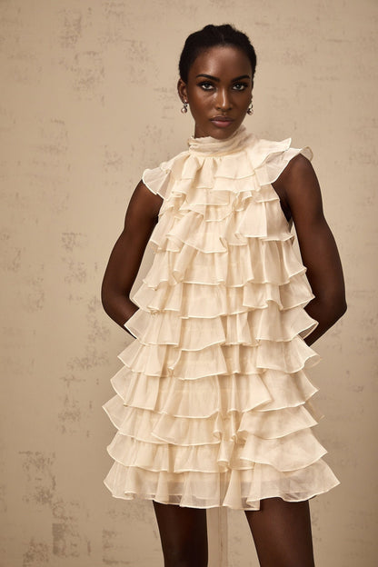 A sleeveless mini dress with tiered flounce details named Jessica featuring multiple layered ruffles on a short skirt