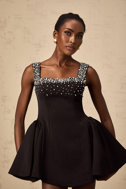 Black mini dress with flared skirt and crystal embellishments named Melanie
