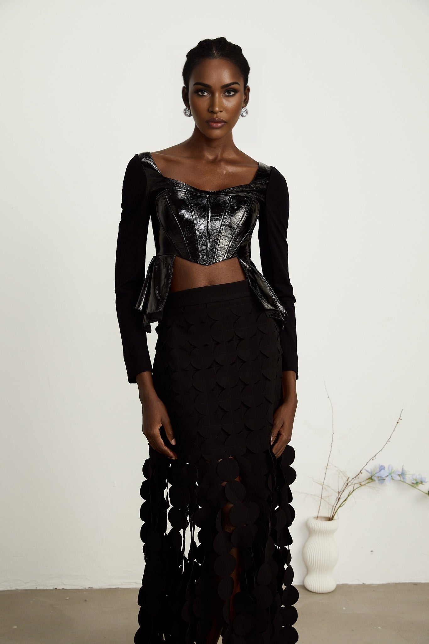 Jeannette fauxleather peplum panelled top