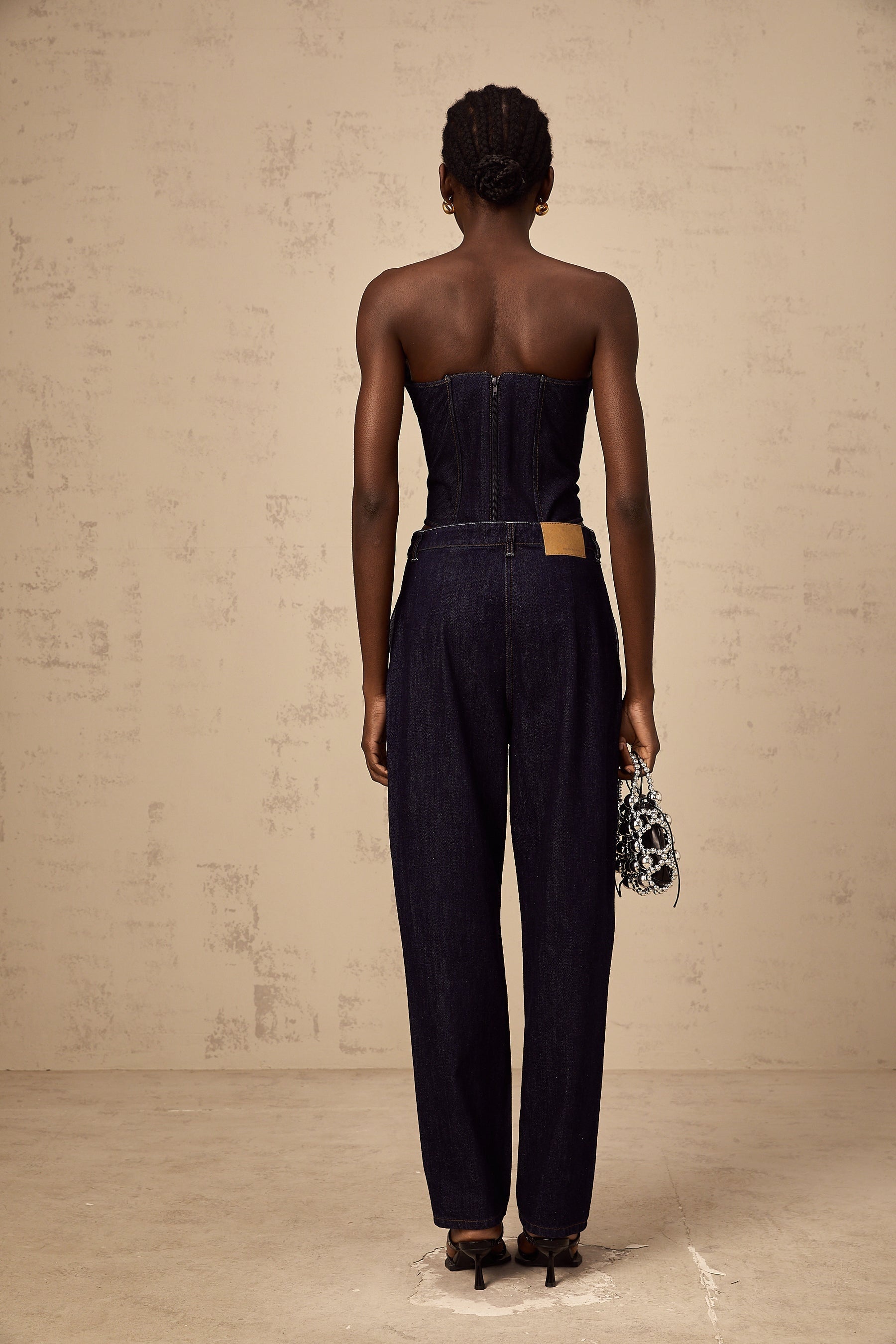 A dark blue off shoulder denim top from Kleber