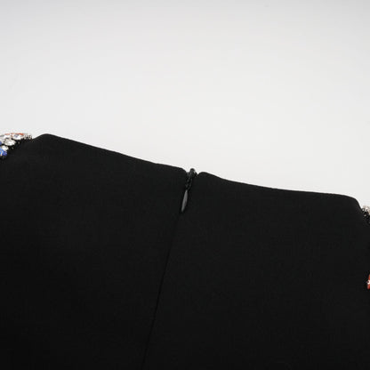 Maëlys black crystalembellished midi dress