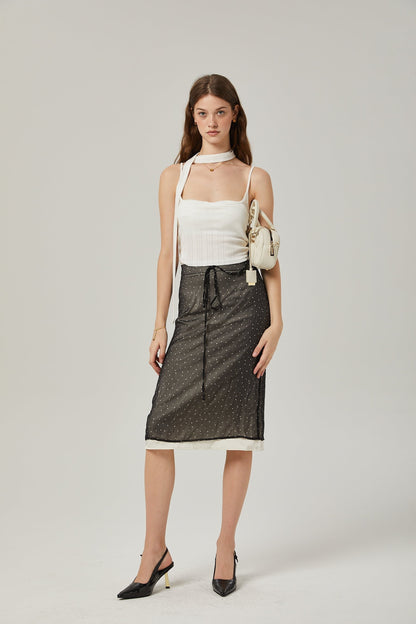 Gisèle tiewaisted polkadot print skirt