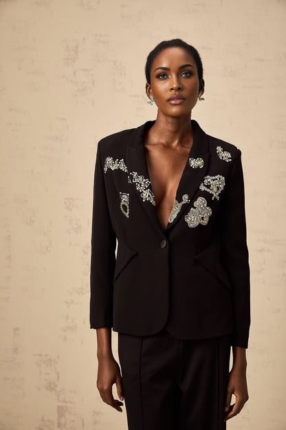 A black blazer with intricate bead embroidery details named Ximena