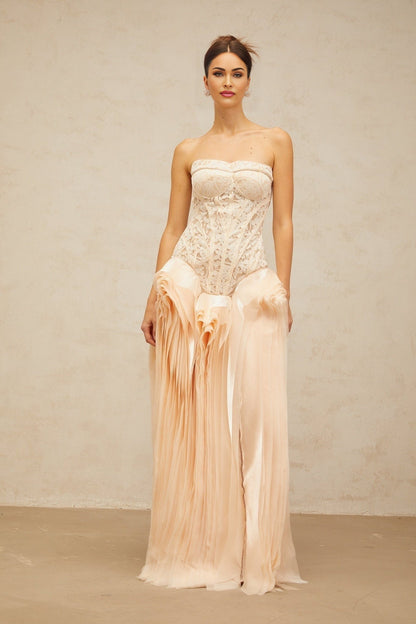 A long maxi dress featuring a layered corset top with lace detailing in neutral tones named Irene