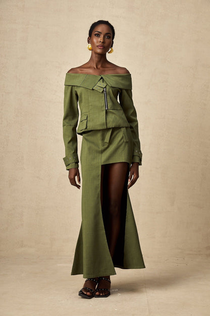 Green asymmetric jacket and skirt set named Elena featuring matching design