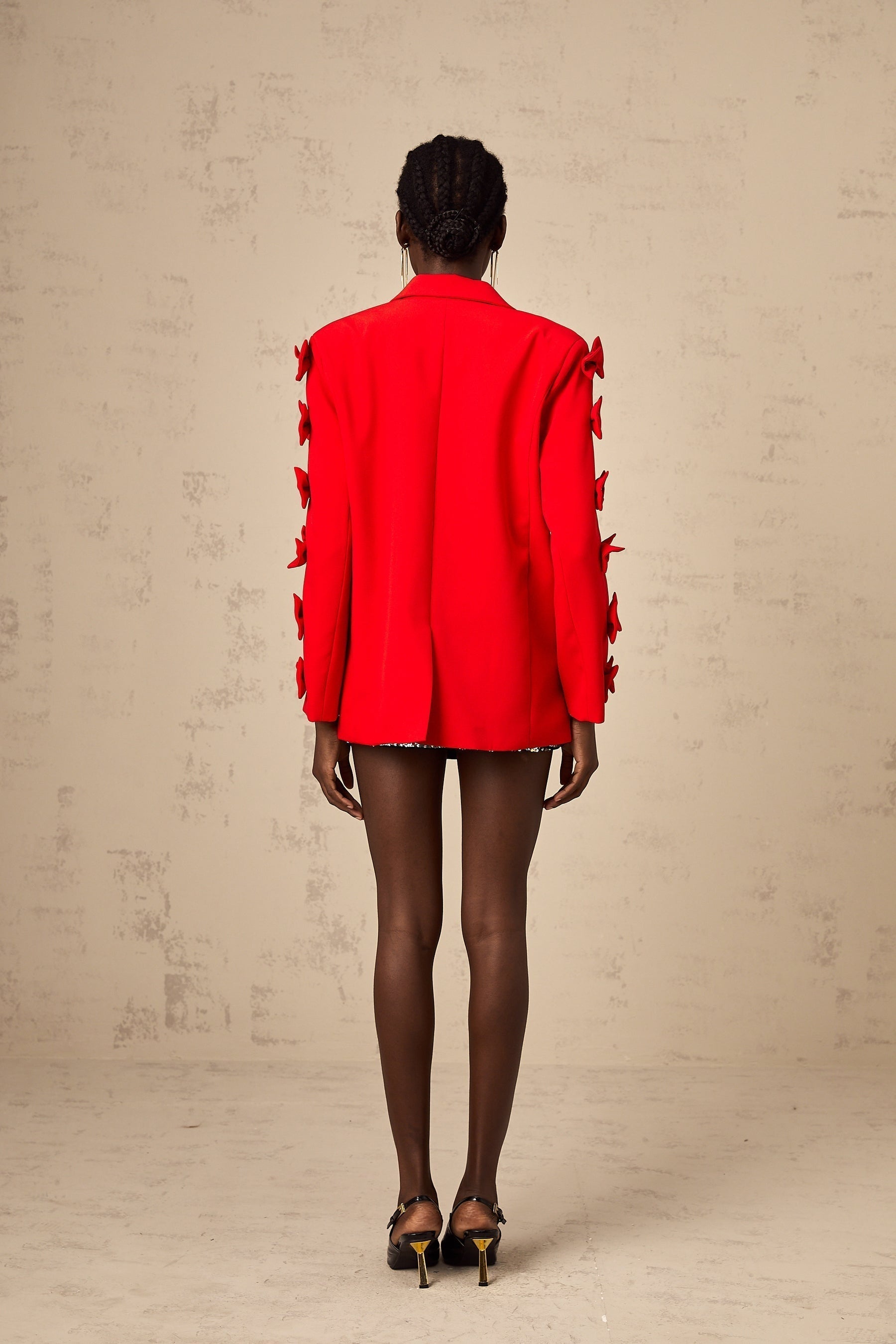 Stylish red blazer with bowknot detail and cutout design
