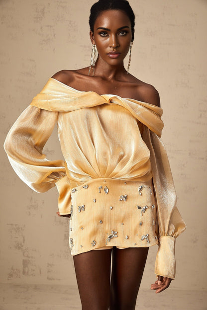 Adelina gold mini dress with crystal embellishments and panelled design