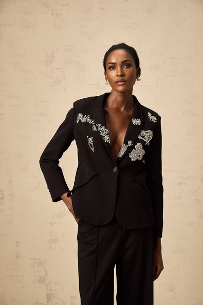 A black blazer with intricate bead embroidery details named Ximena