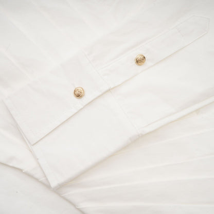Alt text White pleated mini shirt dress with fitted waist by Orlane