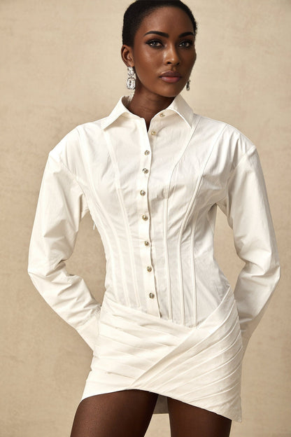 Simple white pleated mini shirt dress with fitted waist by Orlane
