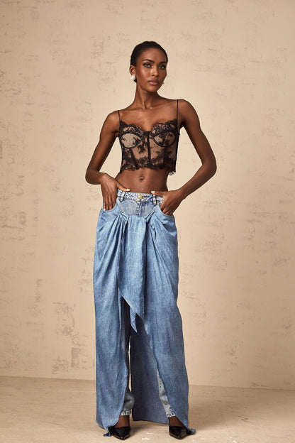 A pair of blue layered denim jeans named Ysabella featuring multiple fabric layers for a stylish and unique look