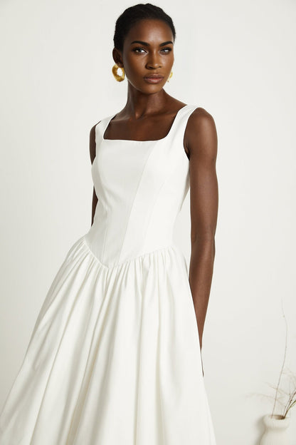 White pleated corset dress named Sadie