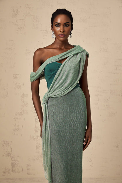 A green maxi dress with a corset bodice featuring ribbon design details and a flowing long skirt