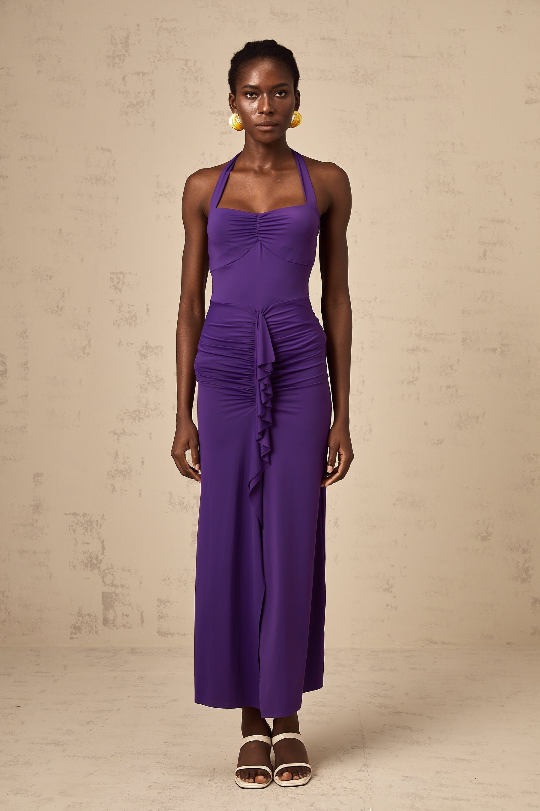 A purple halterneck midi dress with ruched detailing named Renata