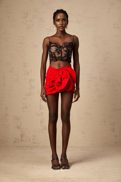 Red mini skirt with floral applique details and boned structure named Anne