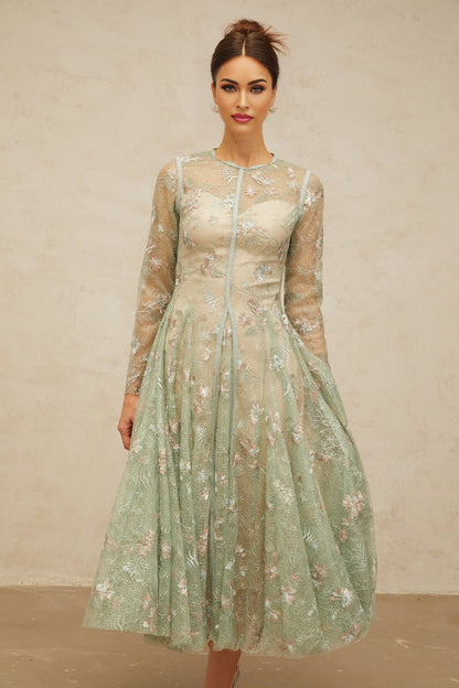 A green pleated midi dress with floral embroidery details named Philomene