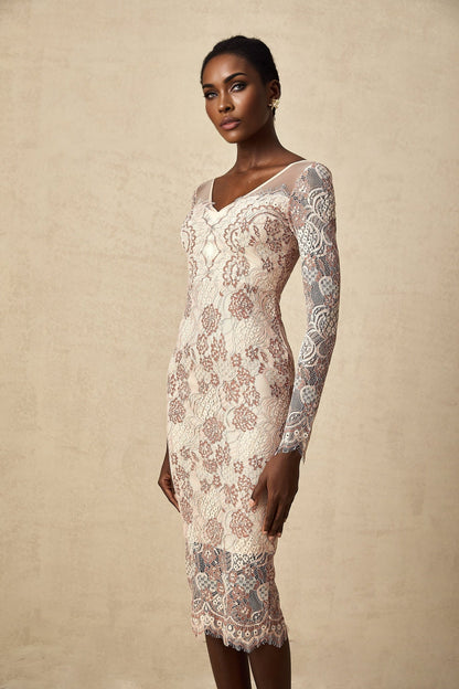 A white fitted midi dress with intricate guipure lace pattern and sheer sleeves on a female model