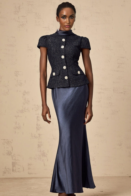 A long blue maxi dress with a peplum waist and panelled design named Josette