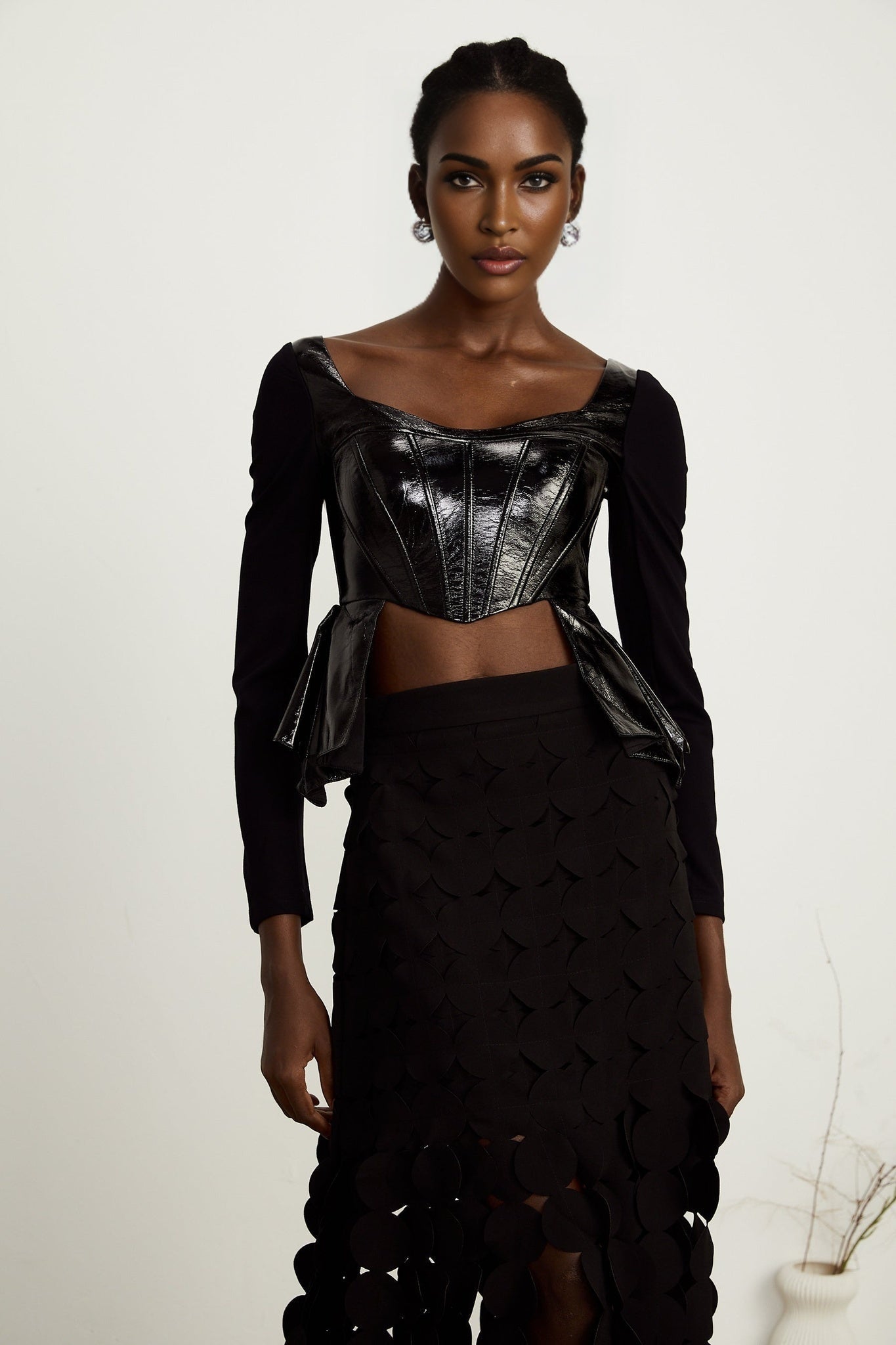 Jeannette fauxleather peplum panelled top
